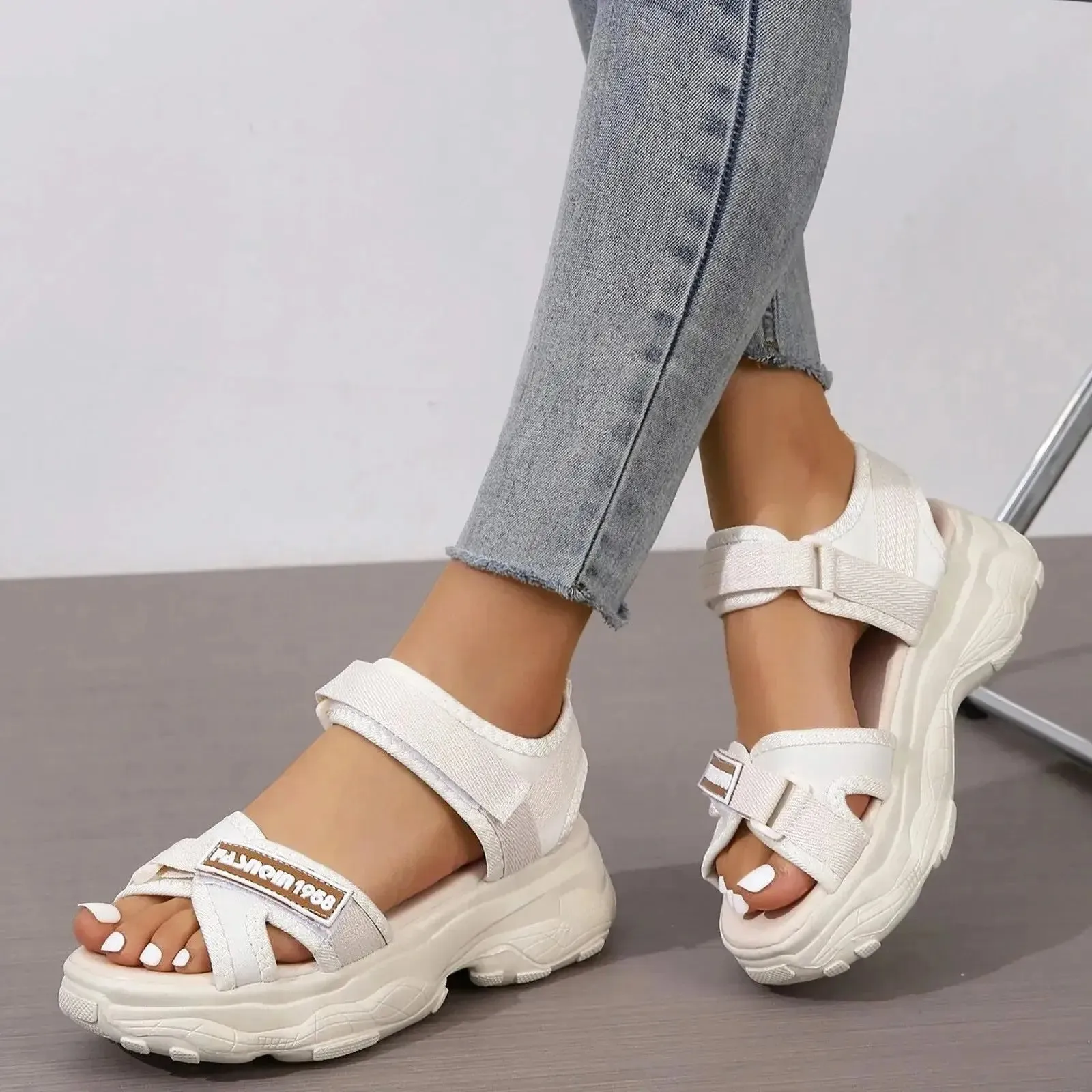 Women’s sporty sandals with hook and loop strap, striped design and ankle support