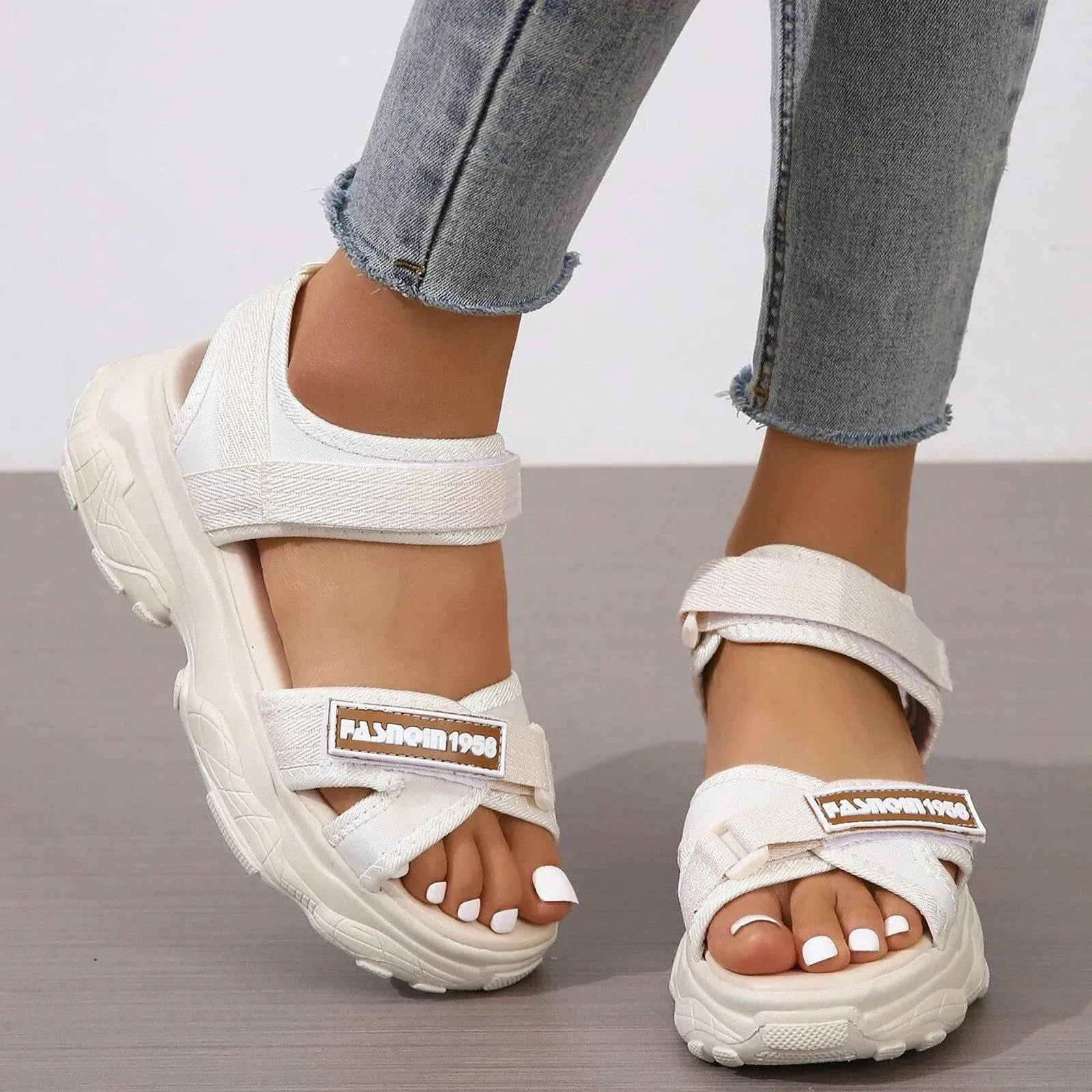 Women’s sporty sandals with hook and loop strap, striped design and ankle support