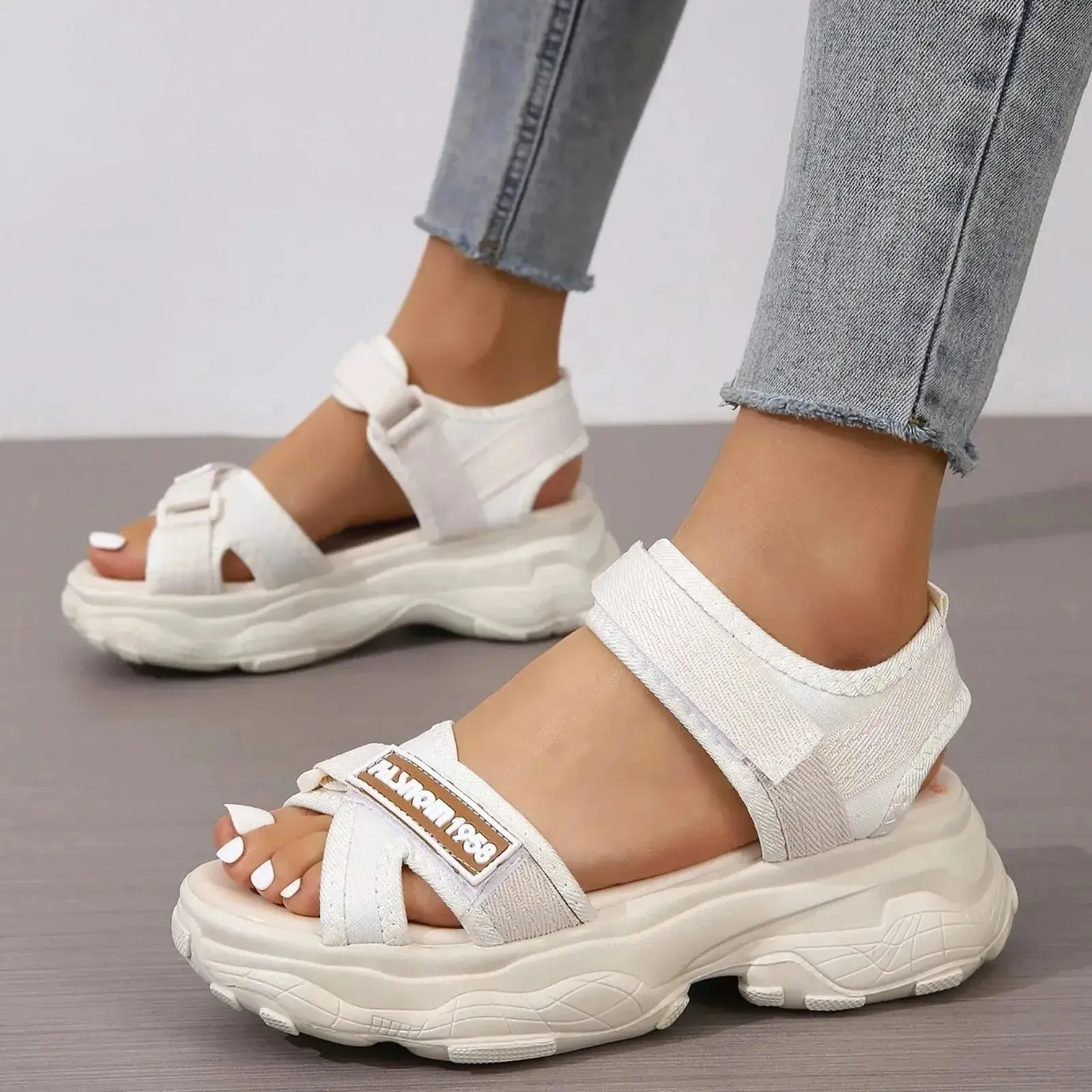 Women’s sporty sandals with hook and loop strap, striped design and ankle support