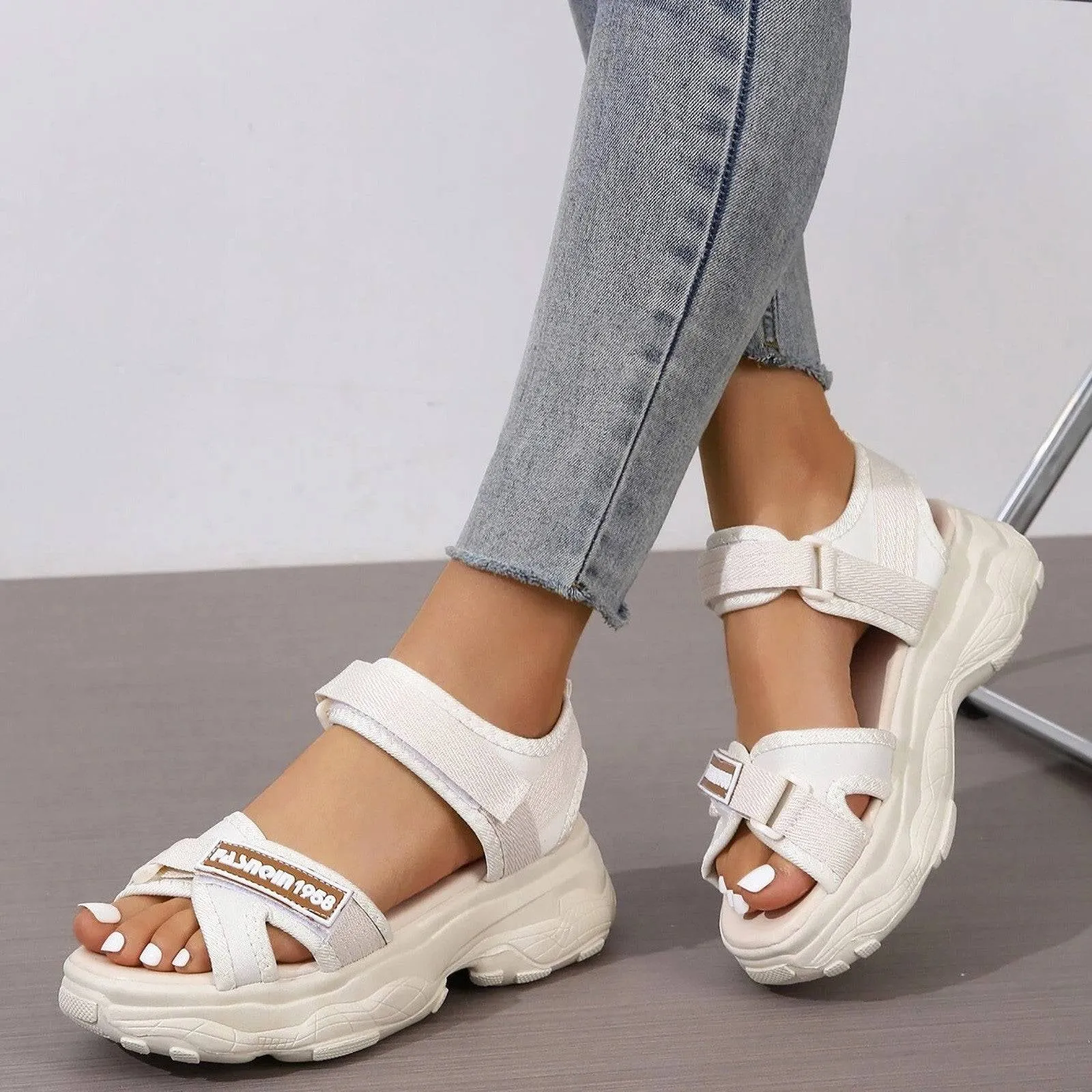 Women’s sporty sandals with hook and loop strap, striped design and ankle support